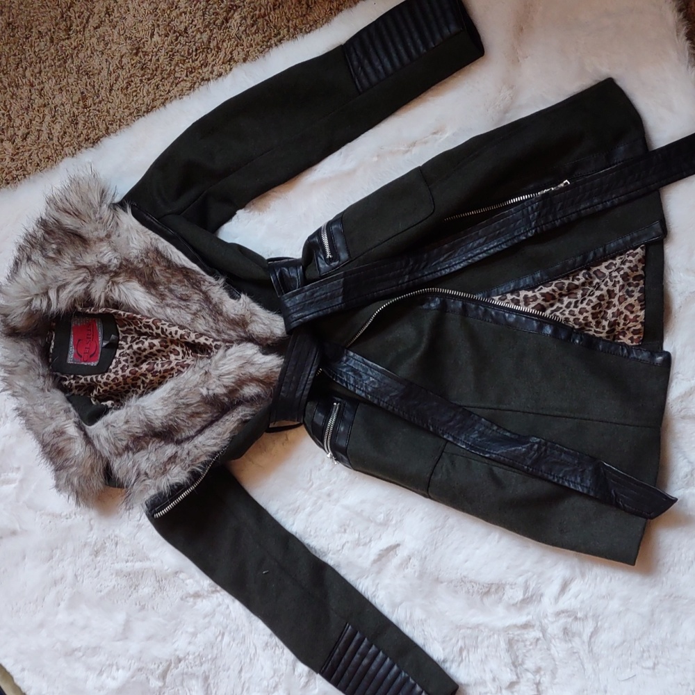 Green coat with faux fur and faux leather accents.